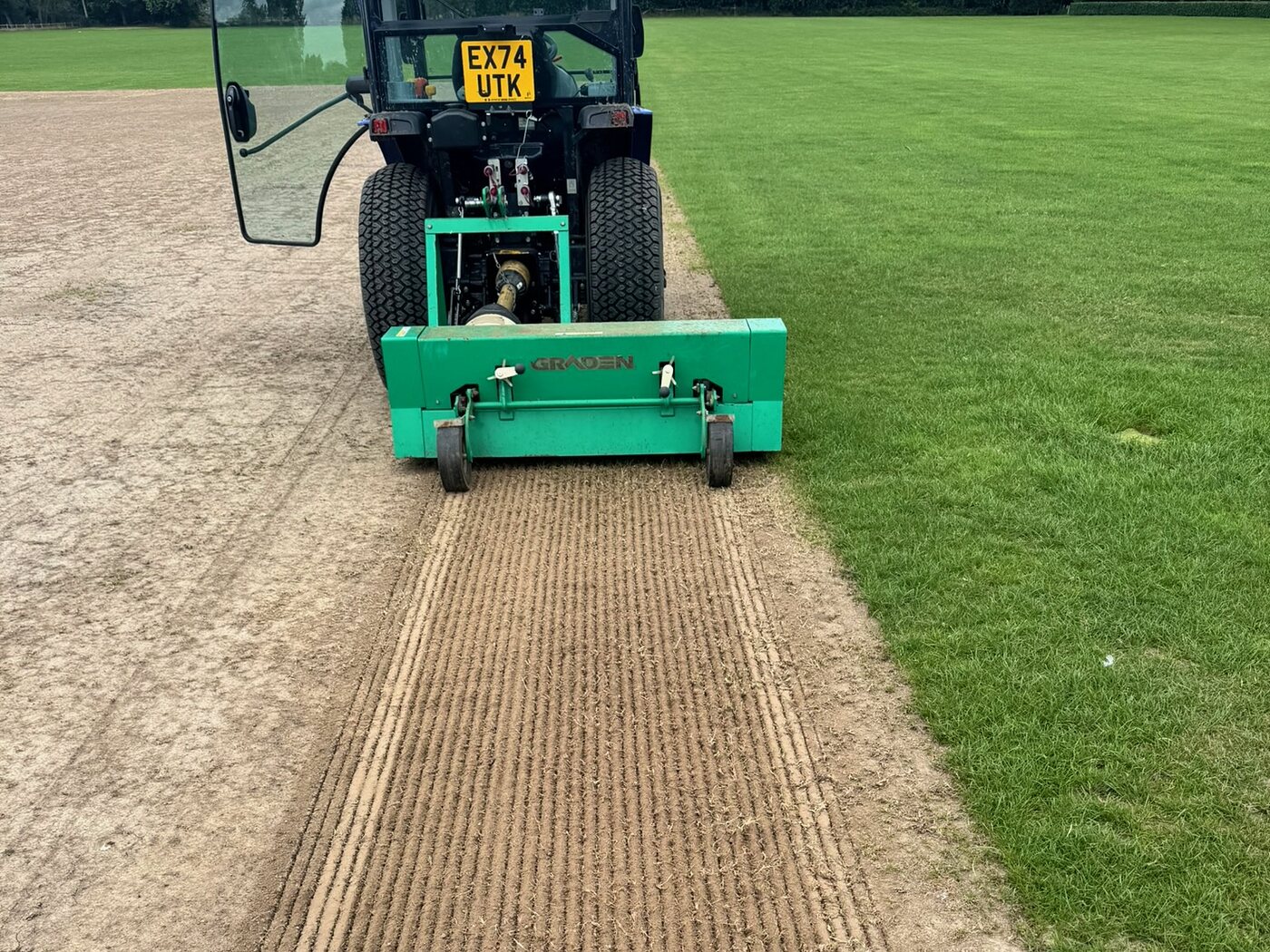 Graden scarifier renovating a cricket square