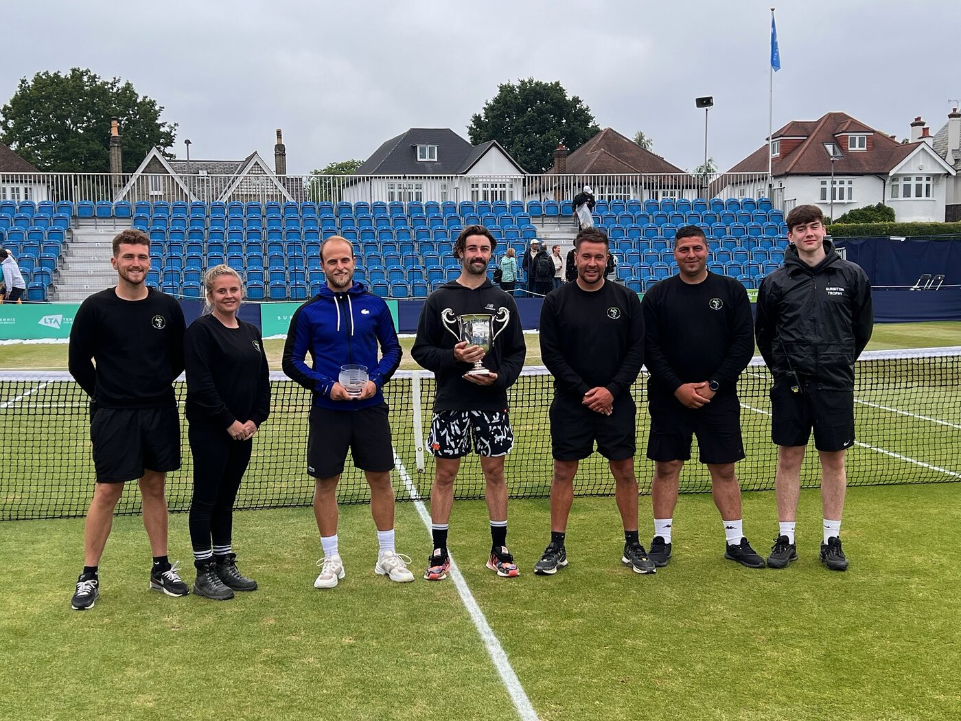 The Sports Turf Limited team on centre court at the Surbiton Trophy